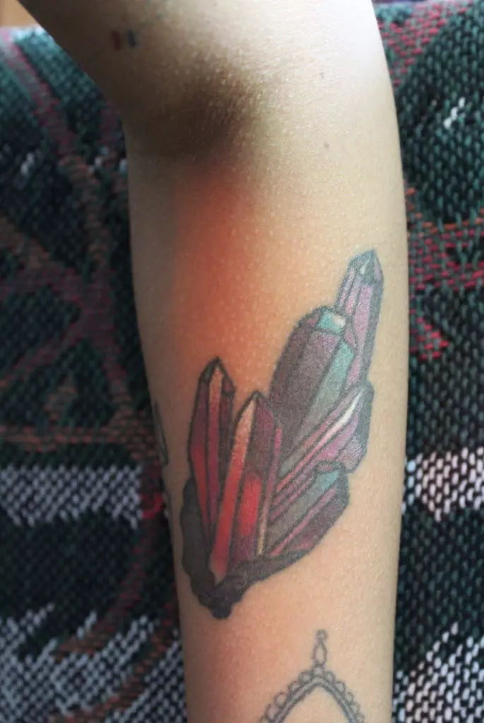 arm tattoo crystals