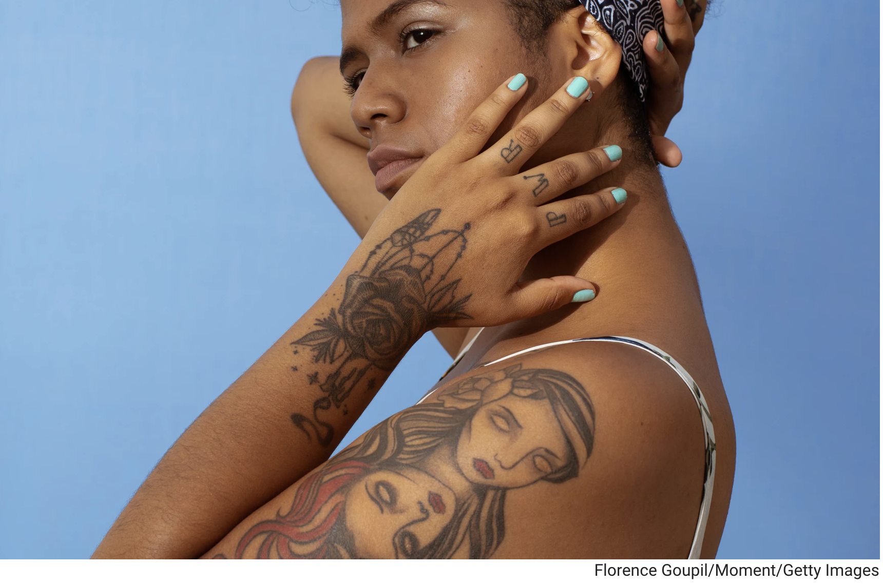woman with tattoo dark skin