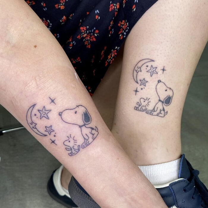 Matching Snoopy tattoos